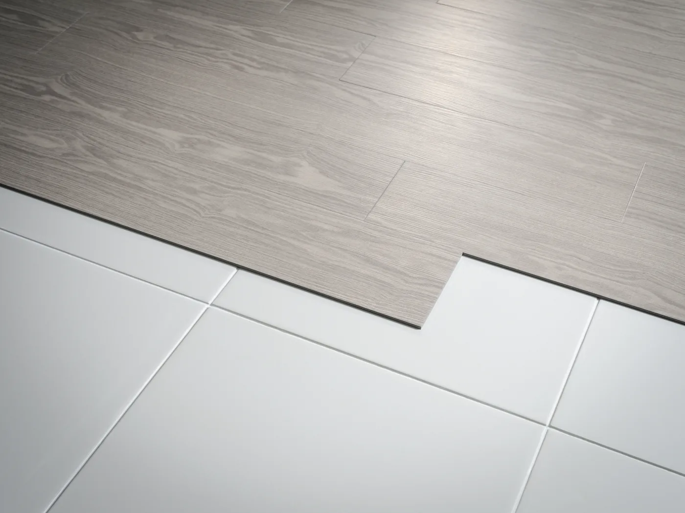 Illustration de dalles aspect bois posées sur un carrelage existant.